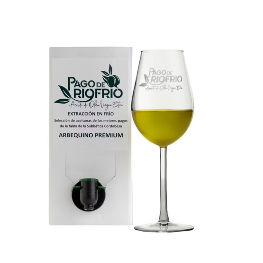 Bag in Box de 3 litros de AOVE Arbequina Premium junto a una copa de cata